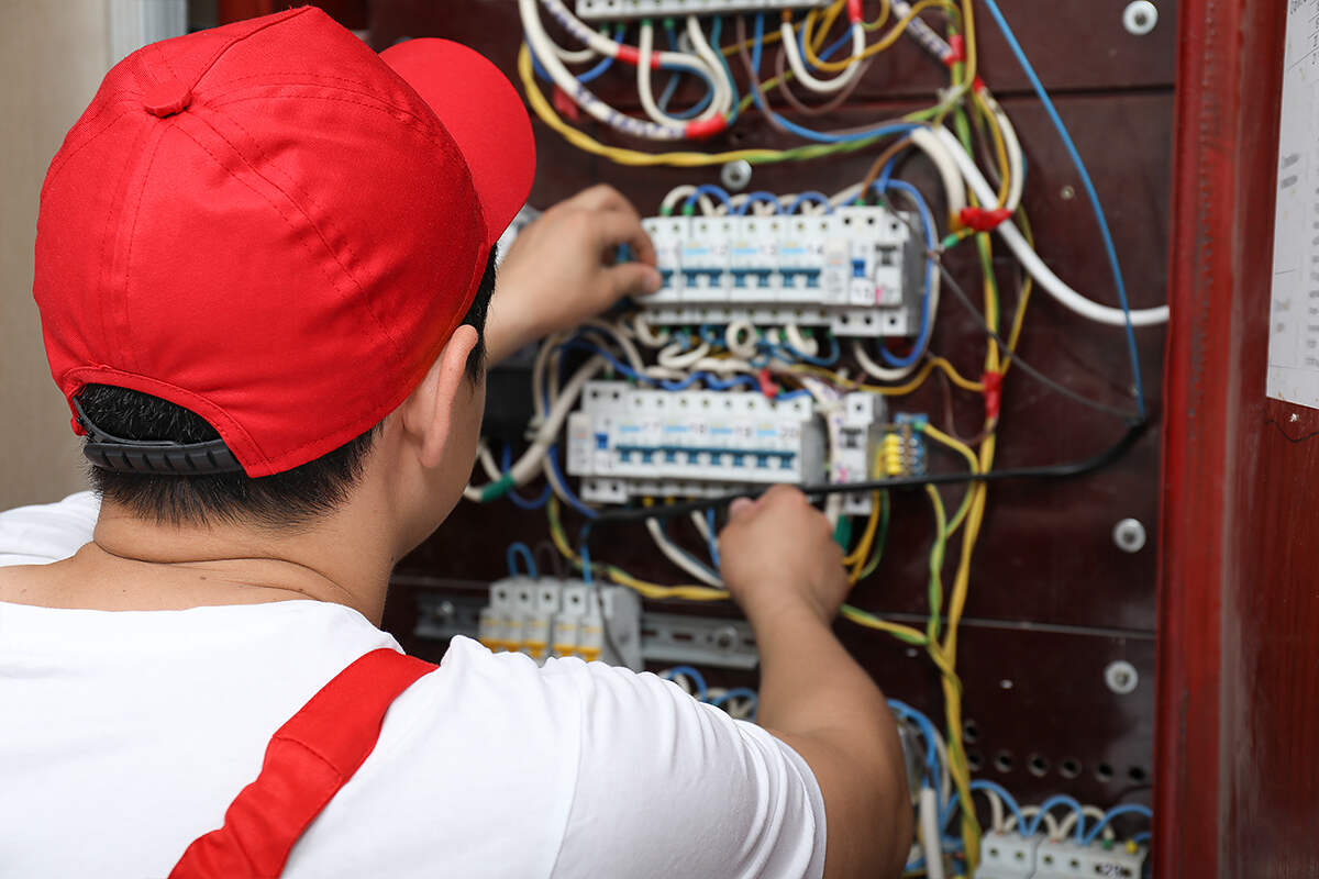 Electrical technician at work